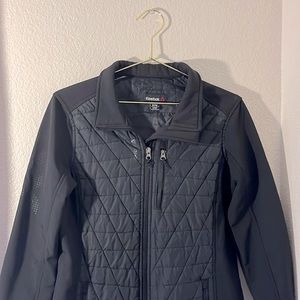 Reebok size medium black jacket.